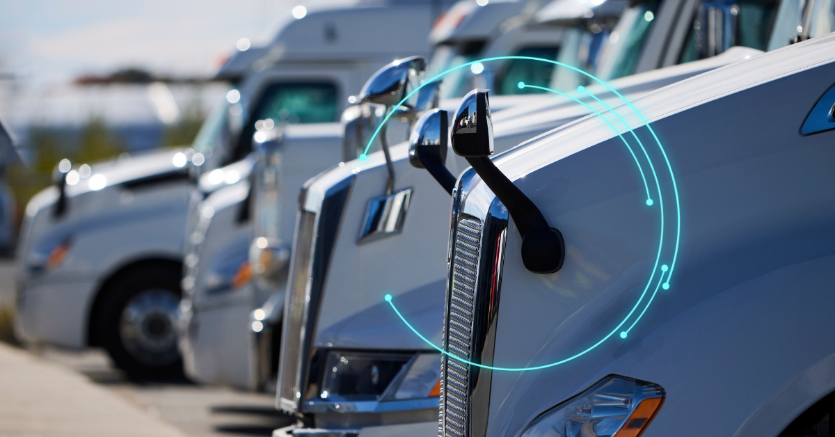 Close-up of truck cabs with blue AI connectivity lines, symbolizing ISAAC's AI integration in trucking.