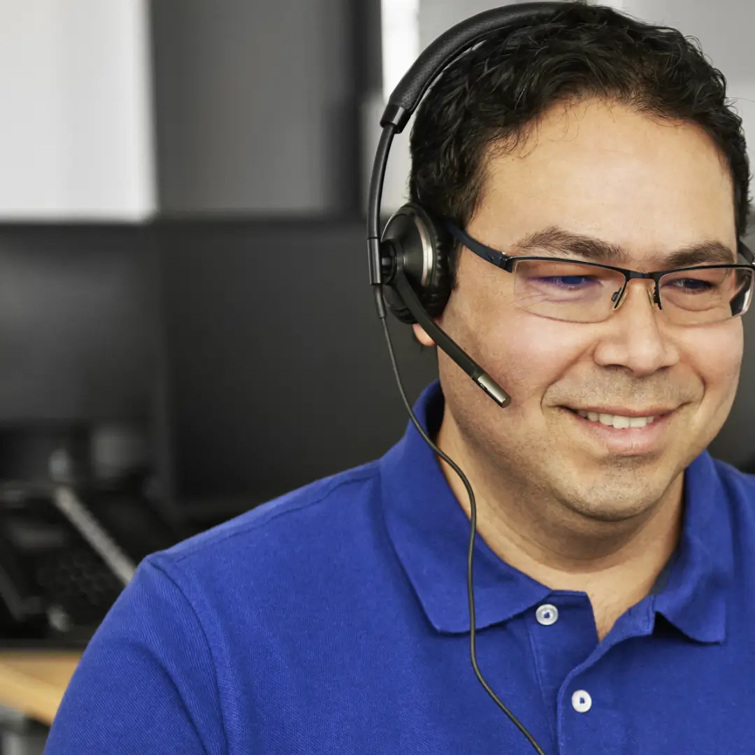 Customer Service Representative Wearing Headset Customer service representative wearing a headset.