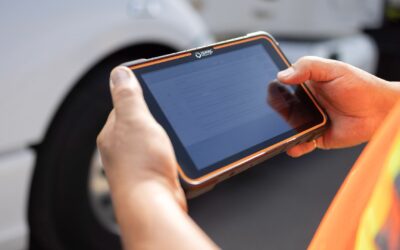 Close-up of ISAAC's rugged in-cab tablet used by a driver for DTTS-certified military freight tracking